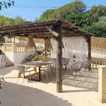 Pergola with dining table